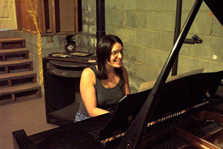 mary at the grand piano